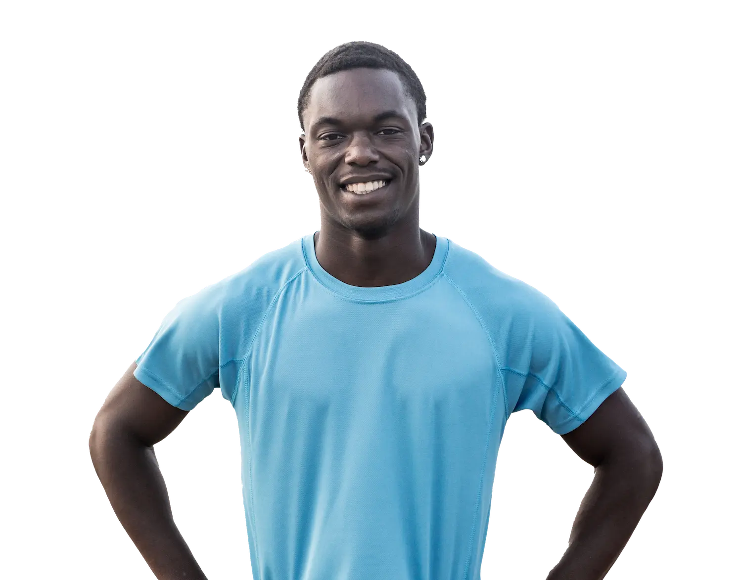 young man standing with his hands on hips