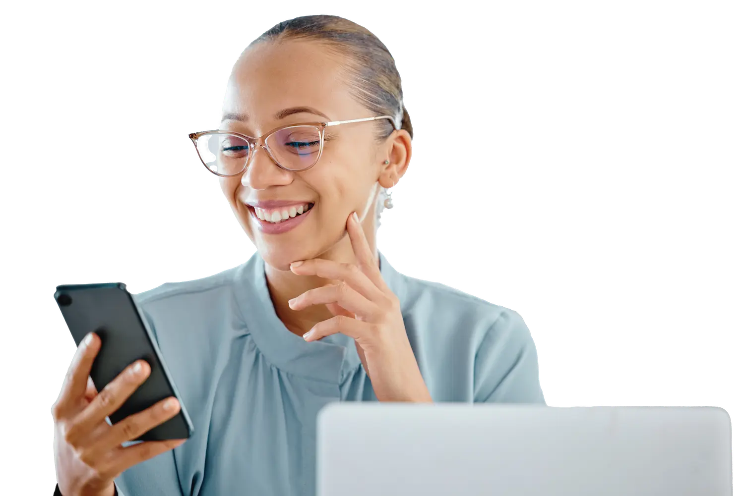 smiling woman looking at her mobile phone