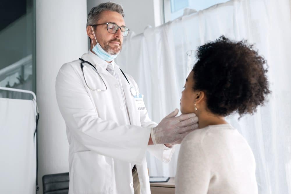 doctor doing a check up on a patient