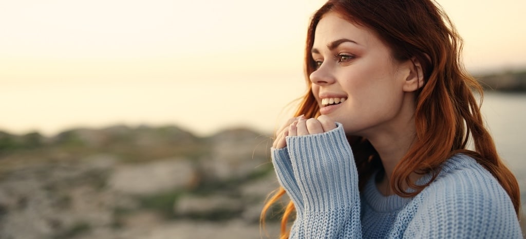 Cheerful woman outdoors landscape