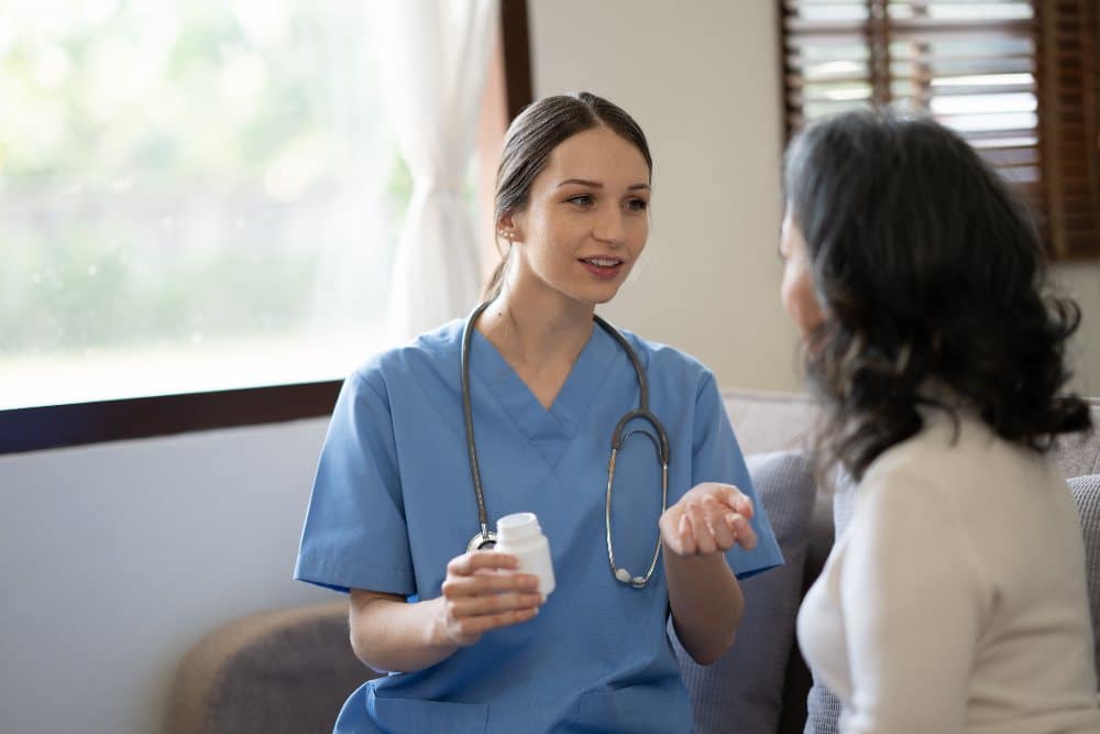 doctor explaining medicine to her patient