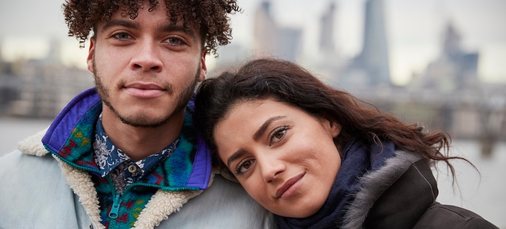 Portrait Of Couple Walking in the city, representing healing from addiction and mental health challenges