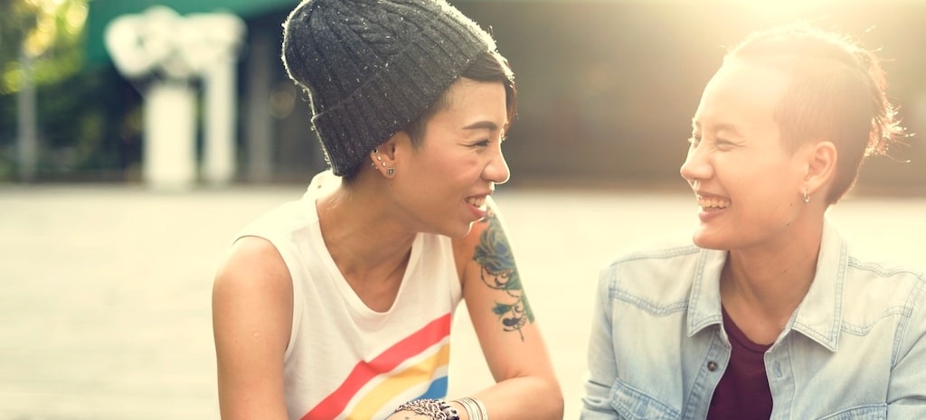 LGBTQIA Couple supporting each other; representing the compassionate support at porch light health, an LGBTQ-friendly addiction treatment center in Colorado and New Mexico